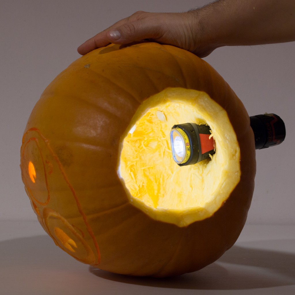 How to carve a hole for the torchlight at the back of your Halloween pumpkin