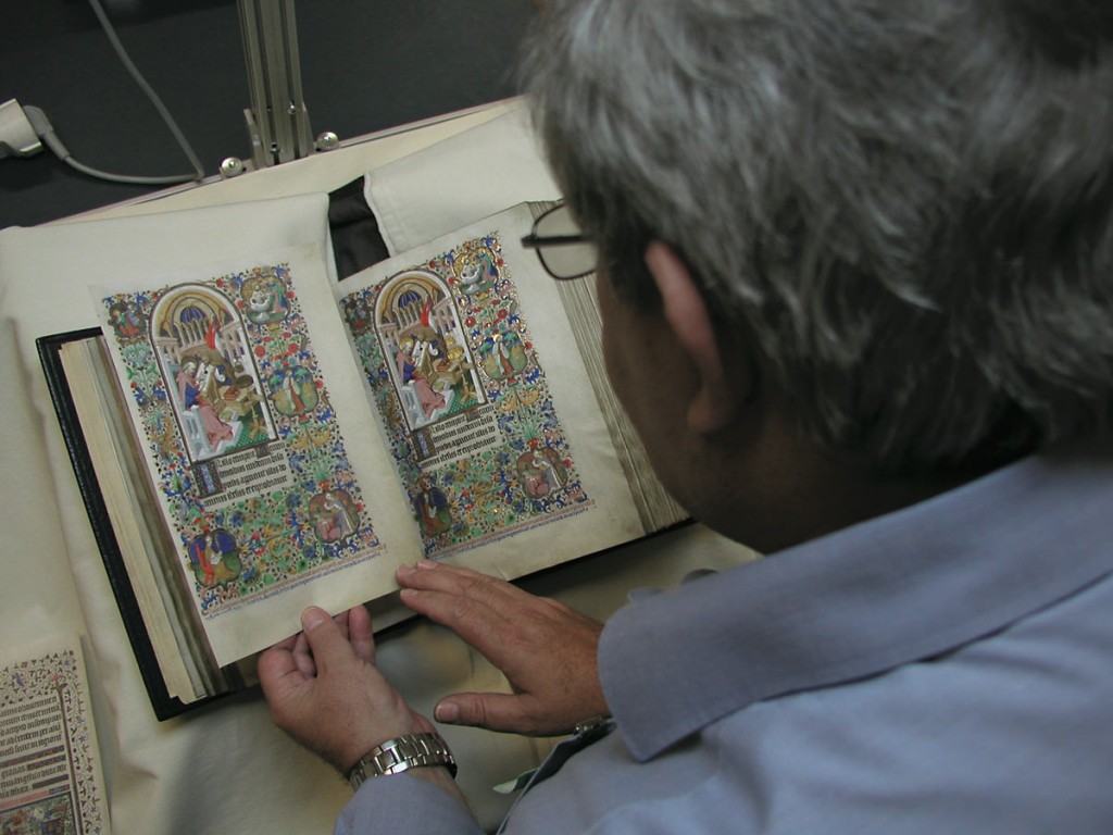 Picture showing a facsimile page compared with the original